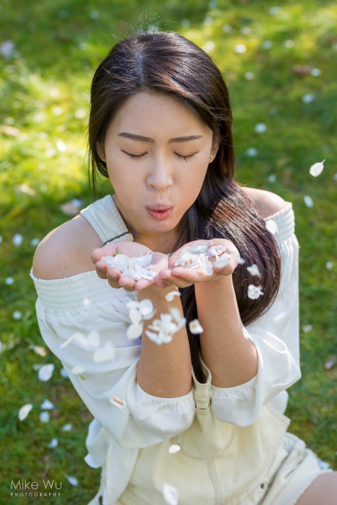 Blowing the sakura blossoms. Model Chloe Ha