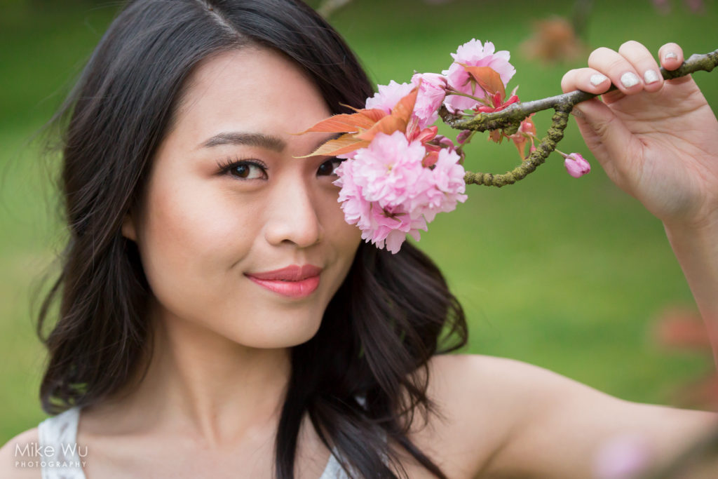 Holding a low sakura branch. Model Joanne Zhou
