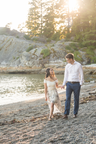 Vancouver, wedding, engagement, photos, whytecliff park, natural, beach, sunset, flare, trees, water, waves, sand, rocks, nature, holding hands, love, couple, loving, beautiful, environment, photography, dress, style, stylish